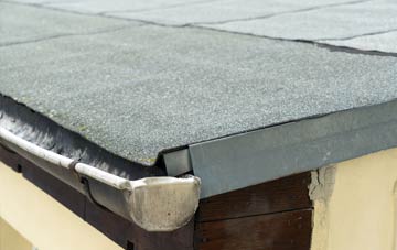 repair or replace Canford Magna flat roofing?